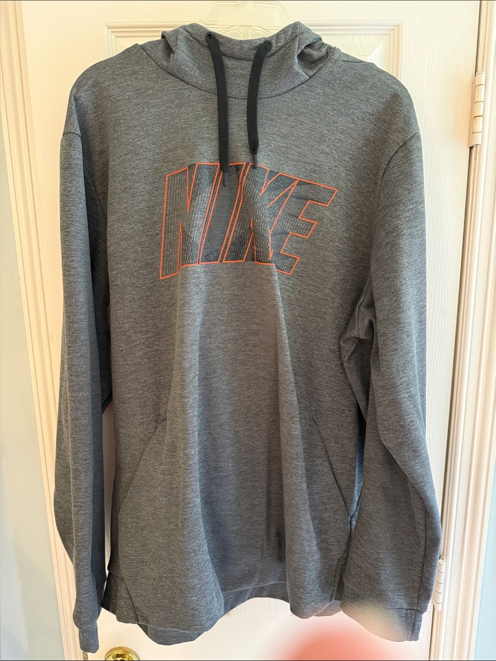 Nike Gray Hoodie with Orange-Outlined Logo